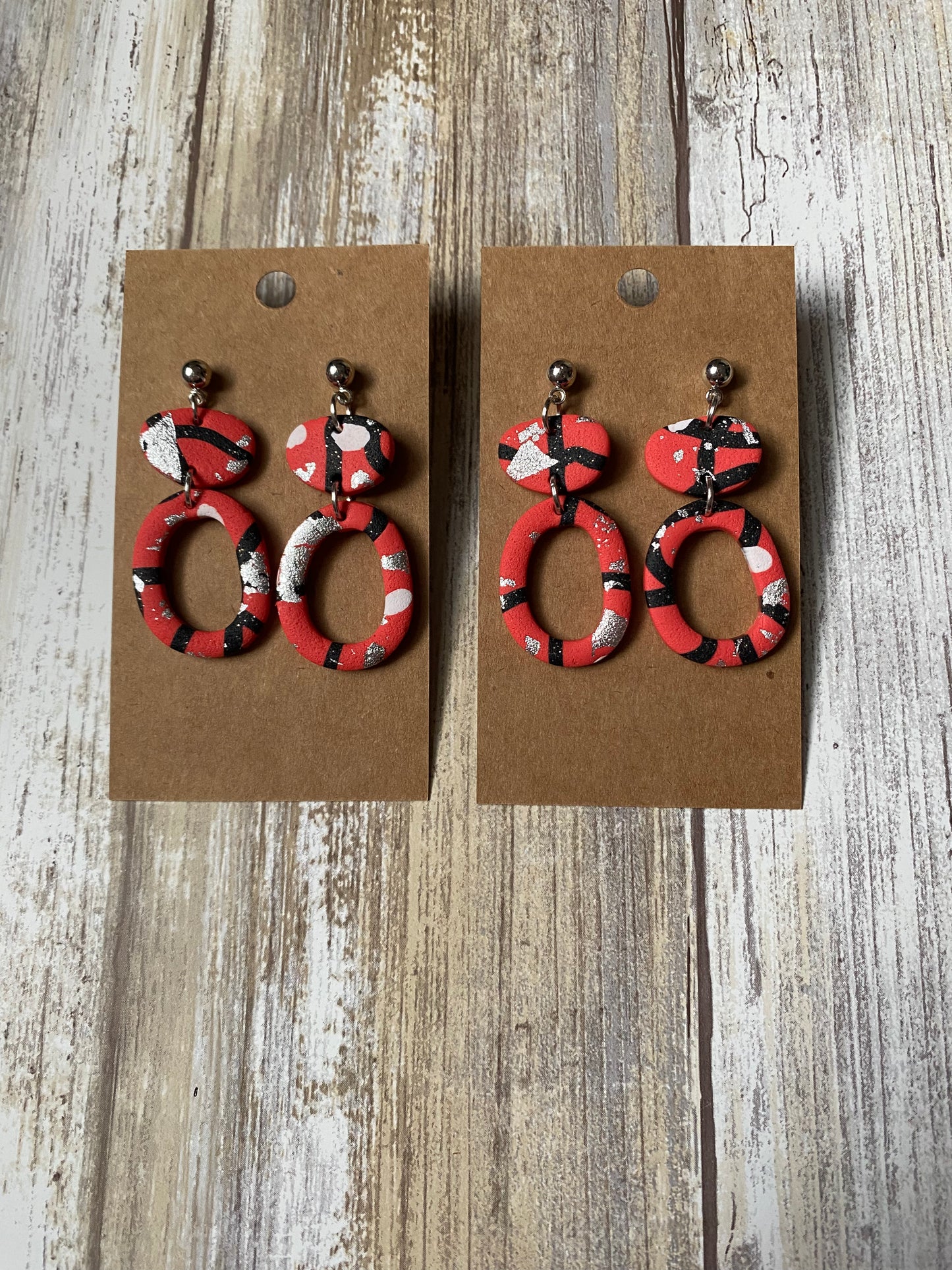Dangle, red with black and white