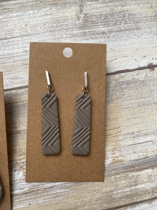 Dangle, gray geometric with bar stud