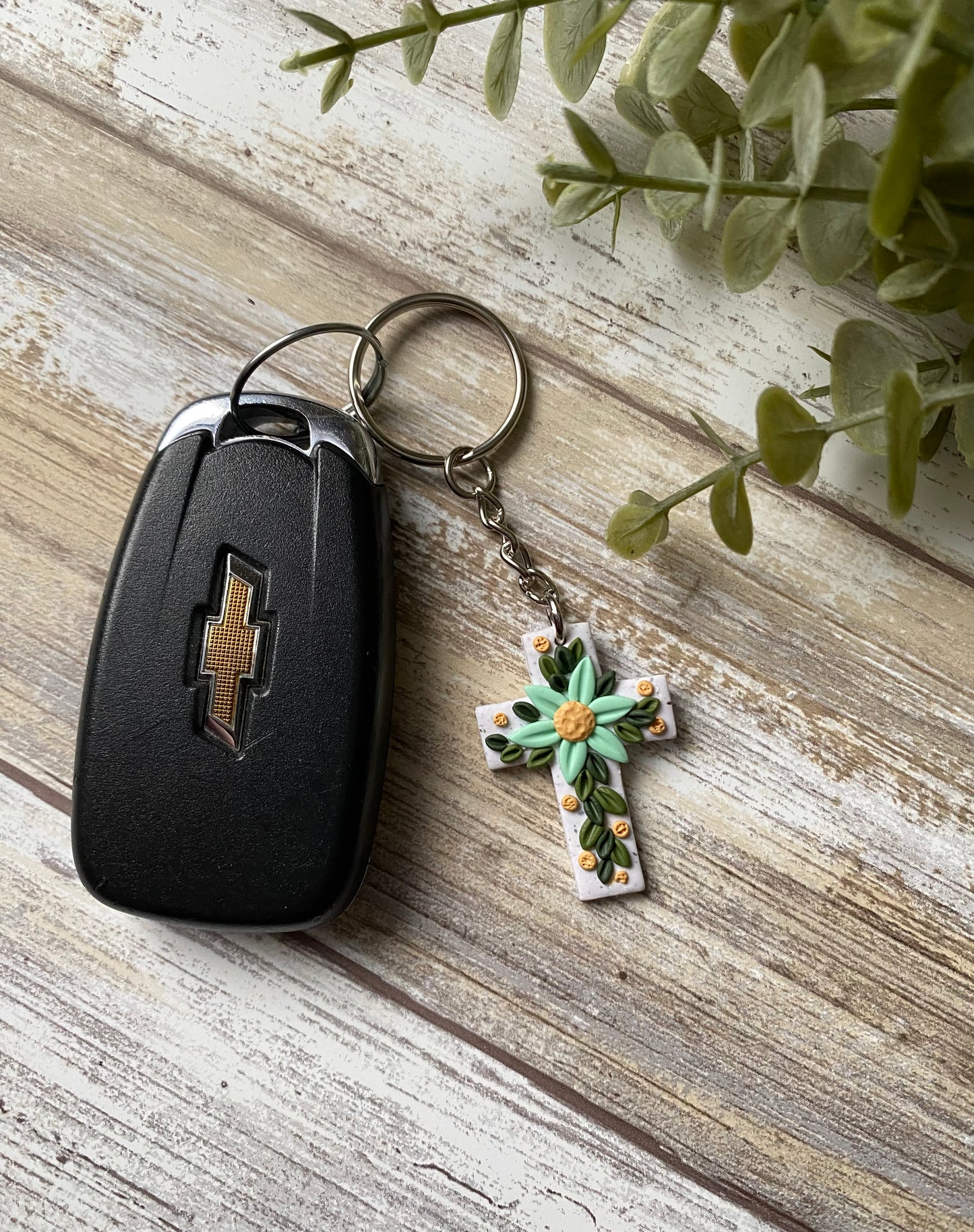 Aquamarine floral cross keychain
