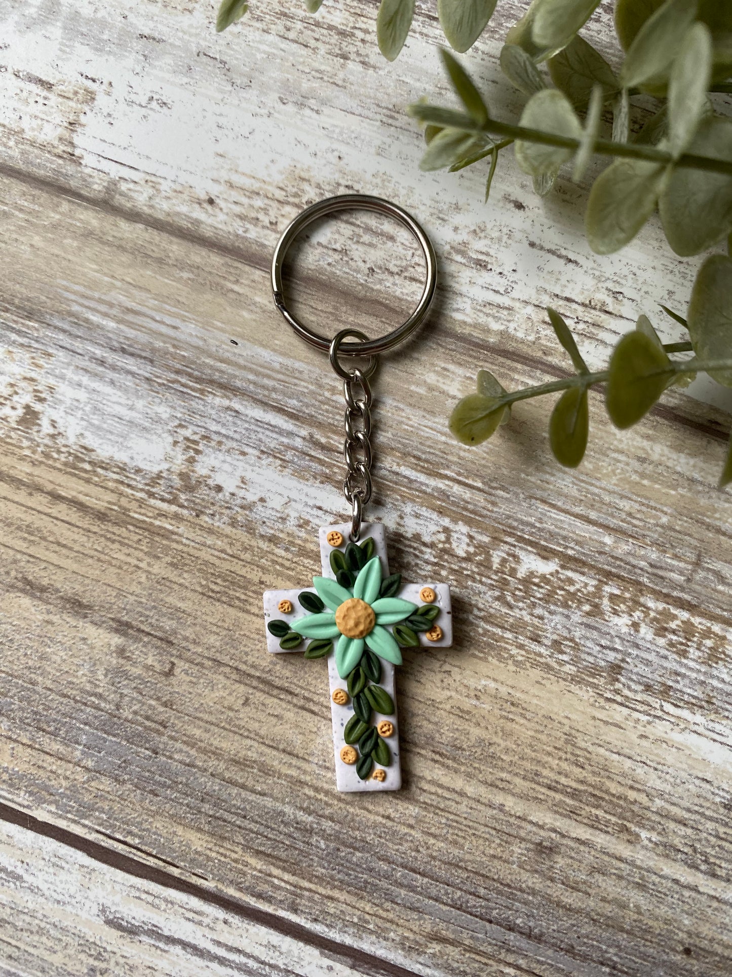 Aquamarine floral cross keychain